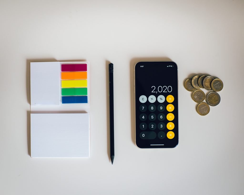 a calculator on phone screen with taxes