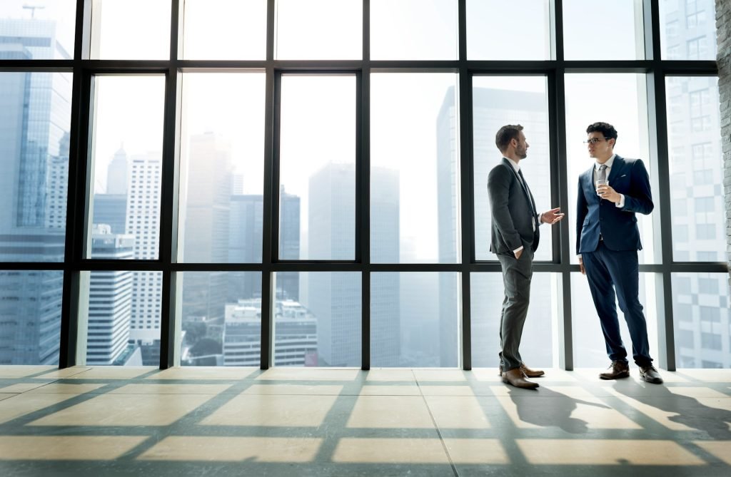 two businessmen talking