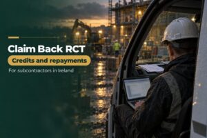How to claim back RCT in Ireland: subcontractor in a van cab at dusk checking paperwork beside a laptop